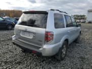 ✅ 2006 Honda Pilot EX-L • VIN: 2HKYF18526H557172 • Lot: 91075345. Listed on Copart with 234,297 mi. Free auction sales archive from the USA and detailed vehicle history report at DreamBid. Image 3.