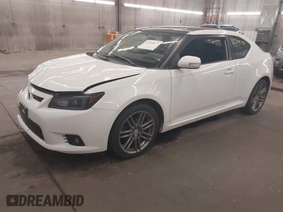 ✅ 2013 Scion tC • VIN: JTKJF5C7XD3063998 • Lot: 42388873. Wystawiony na IAAI z przebiegiem 198 828 mil. Bezpłatny archiwum sprzedaży aukcyjnych z USA i szczegółowy raport historii pojazdu na DreamBid. Zdjęcie 2.