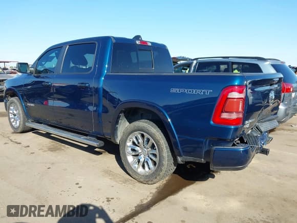 ✅ 2022 Ram 1500 Laramie • VIN: 1C6RREJTXNN291496 • Lot: 43663207. Listed on IAAI with 51,775 mi. Free auction sales archive from the USA and detailed vehicle history report at DreamBid. Image 3.