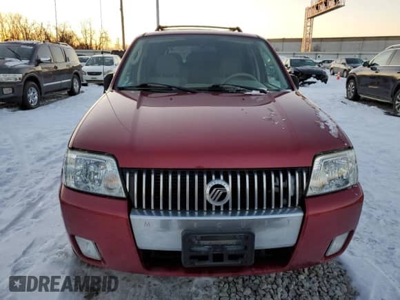 2006 Mercury Mariner Luxury with VIN 4M2YU56146DJ09769, listed as a Copart auction lot 87851795 with 80,894 mi miles and Salvage title. Bid and sale history available at DreamBid. Image 5.