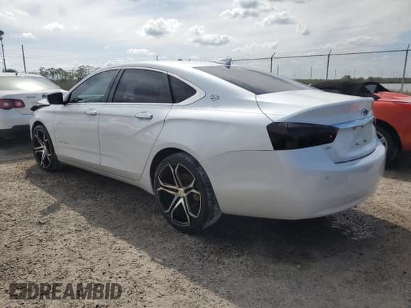 ✅ 2015 Chevrolet Impala LT • VIN: 1G1125S37FU147087 • Лот: 71873654. Опубликован ранее на Copart с пробегом 143 610 миль. Бесплатный доступ к архиву аукционных продаж из США и подробный отчёт об истории автомобиля на DreamBid. Изображение 2.