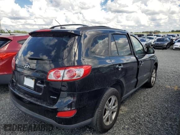 ✅ 2012 Hyundai Santa Fe Limited • VIN: 5XYZK3AB1CG131231 • Lot: 74253504. Listed on Copart with Not provided. Free auction sales archive from the USA and detailed vehicle history report at DreamBid. Image 3.