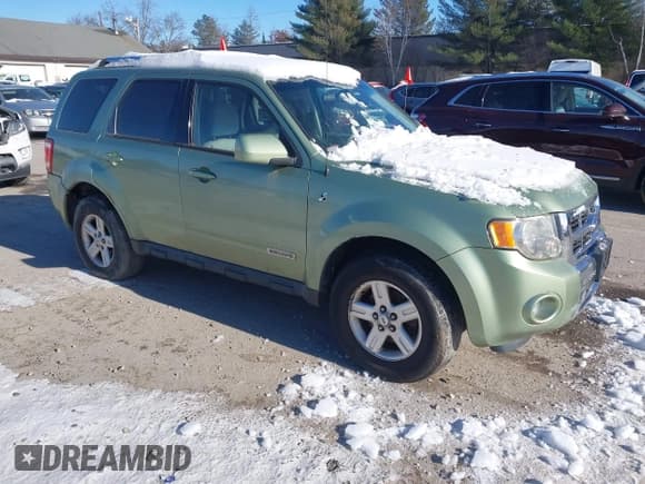 ✅ 2008 Ford Escape Hybrid • VIN: 1FMCU59H08KB53383 • Lot: 43886970. Listed on IAAI with 130,642 mi. Free auction sales archive from the USA and detailed vehicle history report at DreamBid. Image 1.