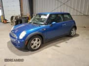 ✅ 2006 MINI Hardtop • VIN: WMWRC33506TJ77806 • Lot: 60921115. Listed on Copart with 86,927 mi. Free auction sales archive from the USA and detailed vehicle history report at DreamBid. Image 1.