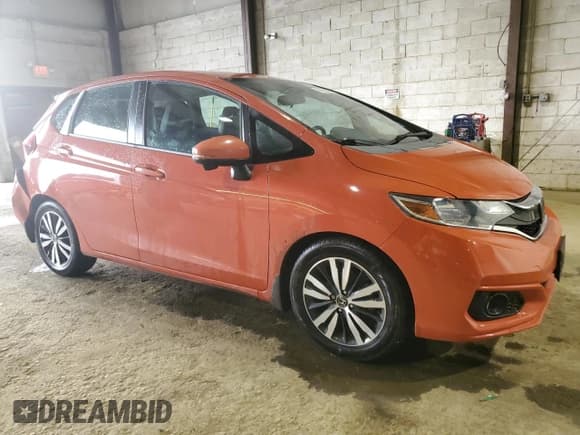 ✅ 2018 Honda Fit EX-L • VIN: 3HGGK5H99JM723483 • Lot: 66750695. Listed on Copart with 82,745 mi. Free auction sales archive from the USA and detailed vehicle history report at DreamBid. Image 4.