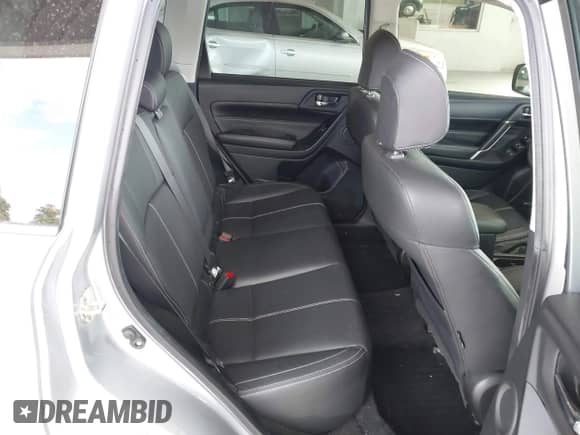 2017 Subaru Forester Touring z VIN JF2SJAWC7HH555670, wystawiony jako IAAI lot #43471642 z przebiegiem 89 476 mil mil oraz . Historia ofert i sprzedaży dostępna na DreamBid. Obrazek 8.