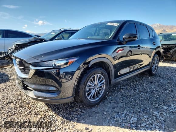 ✅ 2019 Mazda CX-5 Sport • VIN: JM3KFBBM8K0670585 • Lot: 86094365. Wystawiony na Copart z przebiegiem 74 245 mil. Bezpłatny archiwum sprzedaży aukcyjnych z USA i szczegółowy raport historii pojazdu na DreamBid. Zdjęcie 1.