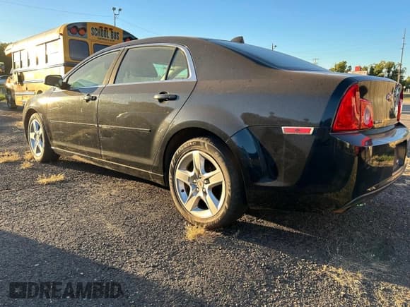 ✅ 2012 Chevrolet Malibu 1LS • VIN: 1G1ZB5E07CF341221 • Lot: 76904014. Listed on Copart with 160,156 mi. Free auction sales archive from the USA and detailed vehicle history report at DreamBid. Image 3.