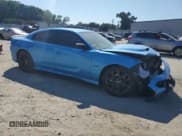 ✅ 2023 Dodge Charger R/T • VIN: 2C3CDXCT5PH656186 • Lot: 82044095. Wystawiony na Copart z przebiegiem 12 749 mil. Bezpłatny archiwum sprzedaży aukcyjnych z USA i szczegółowy raport historii pojazdu na DreamBid. Zdjęcie 4.