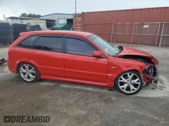 ✅ 2003 Mazda Protege • VIN: JM1BJ245331184730 • Lot: 78996474. Wystawiony na Copart z przebiegiem 192 802 mil. Bezpłatny archiwum sprzedaży aukcyjnych z USA i szczegółowy raport historii pojazdu na DreamBid. Zdjęcie 4.