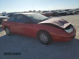 ✅ 2000 Saturn SC • VIN: 1G8ZN1284YZ118197 • Лот: 81569494. Опубликован ранее на Copart с пробегом 254 011 миль. Бесплатный доступ к архиву аукционных продаж из США и подробный отчёт об истории автомобиля на DreamBid. Изображение 4.