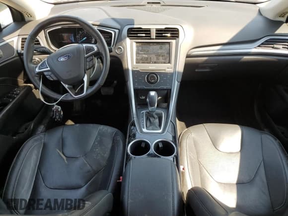 ✅ 2013 Ford Fusion Titanium Hybrid • VIN: 3FA6P0RU7DR309570 • Лот: 63838195. Опубликован ранее на Copart с пробегом 165 797 миль. Бесплатный доступ к архиву аукционных продаж из США и подробный отчёт об истории автомобиля на DreamBid. Изображение 8.