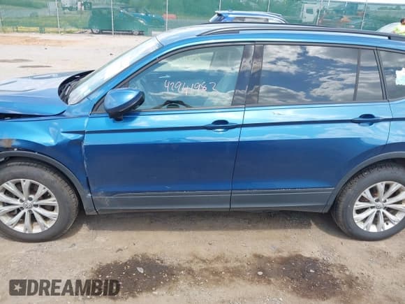 ✅ 2018 Volkswagen Tiguan S • VIN: 3VV0B7AX4JM087786 • Lot: 42941983. Listed on IAAI with 87,202 mi. Free auction sales archive from the USA and detailed vehicle history report at DreamBid. Image 14.