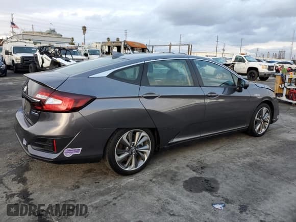 ✅ 2018 Honda Clarity • VIN: JHMZC5F18JC021690 • Lot: 42441643. Listed on Copart with 55,492 mi. Free auction sales archive from the USA and detailed vehicle history report at DreamBid. Image 3.