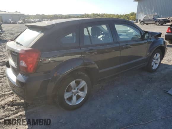 2011 Dodge Caliber Mainstreet с VIN 1B3CB3HA5BD148048, выставлен на аукционе Copart как лот 75441734 с пробегом Не указан миль и Списание • Salvage title. История ставок и продаж доступна на DreamBid. Изображение 3.