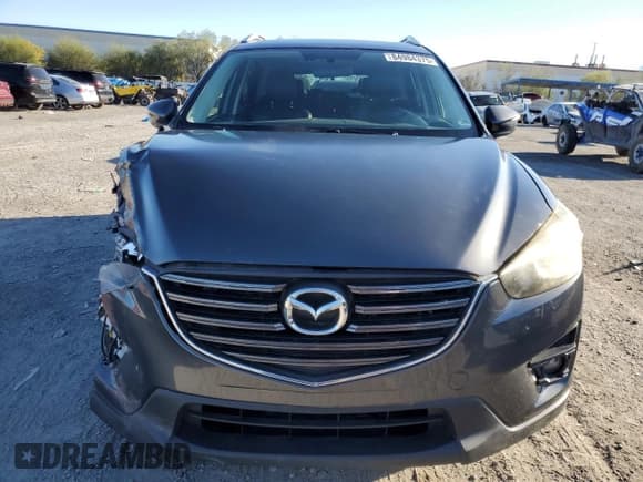 ✅ 2016 Mazda CX-5 Grand Touring • VIN: JM3KE2DY2G0688722 • Лот: 84984375. Опубликован ранее на Copart с пробегом 105 074 миль. Бесплатный доступ к архиву аукционных продаж из США и подробный отчёт об истории автомобиля на DreamBid. Изображение 5.