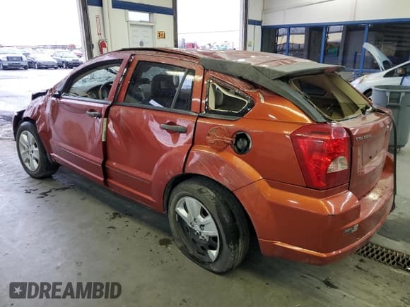 ✅ 2007 Dodge Caliber SXT • VIN: 1B3HB48B27D100938 • Лот: 76766224. Опубликован ранее на Copart с пробегом Не указан. Бесплатный доступ к архиву аукционных продаж из США и подробный отчёт об истории автомобиля на DreamBid. Изображение 2.