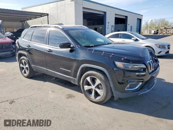 ✅ 2019 Jeep Cherokee Limited • VIN: 1C4PJMDX2KD121456 • Lot: 80253135. Listed on Copart with 152,670 mi. Free auction sales archive from the USA and detailed vehicle history report at DreamBid. Image 4.