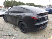 ✅ 2022 Tesla Model Y Long Range • VIN: 7SAYGAEE2NF307710 • Lot: 43544182. Listed on IAAI with 63,135 mi. Free auction sales archive from the USA and detailed vehicle history report at DreamBid. Image 3.