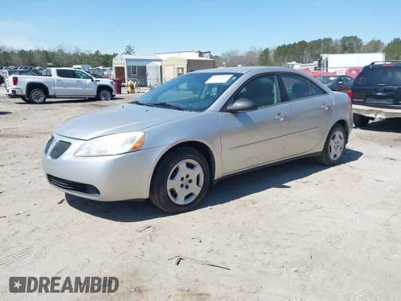 ✅ 2006 Pontiac G6 1SV • VIN: 1G2ZF55B464169067 • Lot: 41811555. Listed on IAAI with 17,574 mi. Free auction sales archive from the USA and detailed vehicle history report at DreamBid. Image 2.
