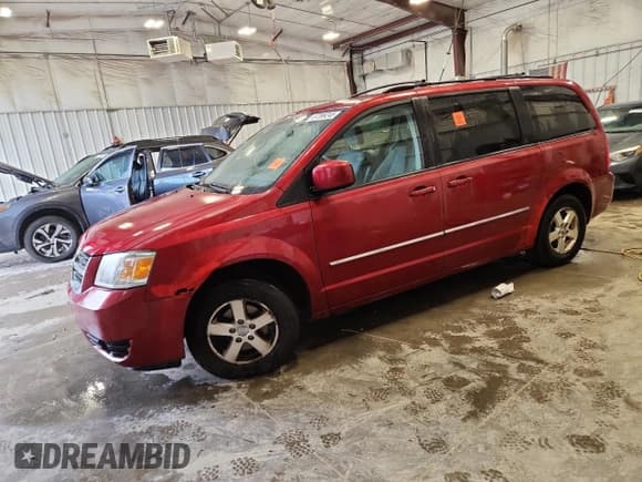 ✅ 2009 Dodge Grand Caravan SXT • VIN: 2D8HN54199R530525 • Лот: 87399245. Опубликован ранее на Copart с пробегом 201 928 миль. Бесплатный доступ к архиву аукционных продаж из США и подробный отчёт об истории автомобиля на DreamBid. Изображение 1.