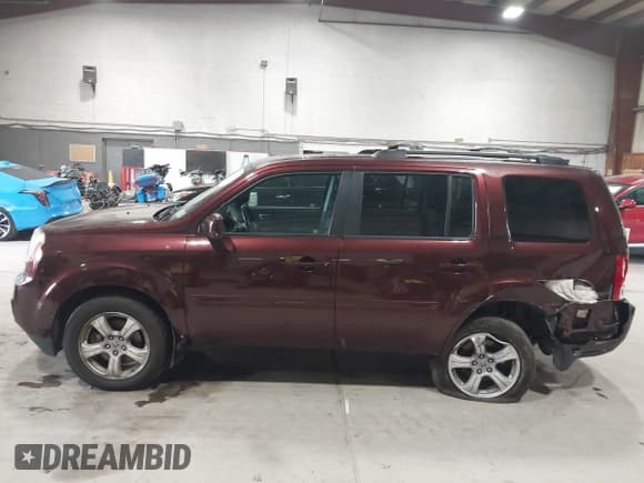 ✅ 2012 Honda Pilot EX-L • VIN: 5FNYF4H57CB069301 • Lot: 43233110. Listed on IAAI with 179,067 mi. Free auction sales archive from the USA and detailed vehicle history report at DreamBid. Image 14.