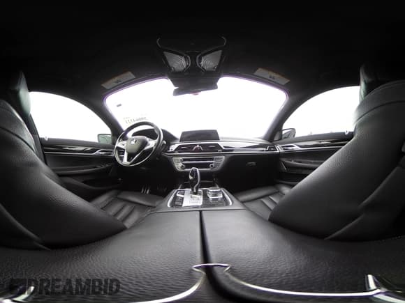 ✅ 2019 BMW 7 Series 740i • VIN: WBA7E2C57KB217973 • Lot: 39064321. Listed on IAAI with 54,818 mi. Free auction sales archive from the USA and detailed vehicle history report at DreamBid. Image 18.