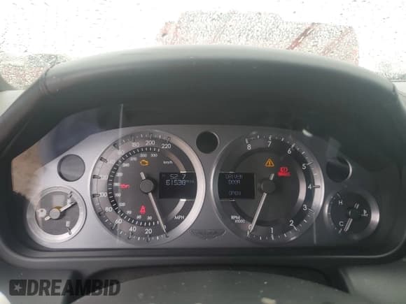 ✅ 2006 Aston Martin Vantage • VIN: SCFBB03BX6GC02042 • Лот: 42527075. Опубликован ранее на Copart с пробегом 61 538 миль. Бесплатный доступ к архиву аукционных продаж из США и подробный отчёт об истории автомобиля на DreamBid. Изображение 9.