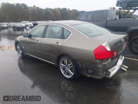 ✅ 2006 Infiniti M • VIN: JNKAY01EX6M116197 • Lot: 43522833. Listed on IAAI with 207,095 mi. Free auction sales archive from the USA and detailed vehicle history report at DreamBid. Image 3.