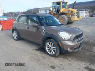✅ 2014 MINI Countryman S • VIN: WMWZC5C59EWP38853 • Lot: 43773822. Listed on IAAI with 83,160 mi. Free auction sales archive from the USA and detailed vehicle history report at DreamBid. Image 1.