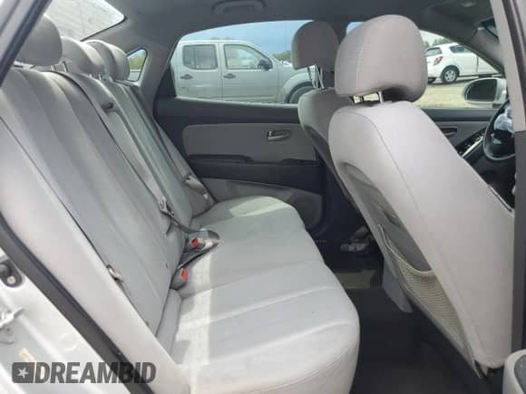 2009 Hyundai Elantra GLS z VIN KMHDU46DX9U688971, wystawiony jako Copart lot #69621965 z przebiegiem Nie podano mil oraz Szkoda całkowita • Salvage title. Historia ofert i sprzedaży dostępna na DreamBid. Obrazek 10.