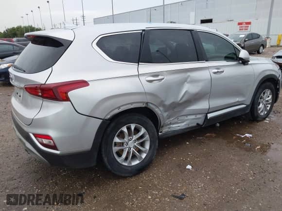 2019 Hyundai Santa Fe SEL Plus z VIN 5NMS33AD3KH130800, wystawiony jako IAAI lot #42666362 z przebiegiem 102 952 mil mil oraz . Historia ofert i sprzedaży dostępna na DreamBid. Obrazek 4.