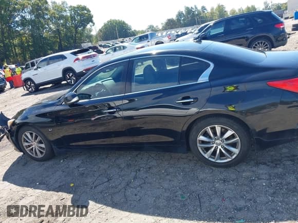 ✅ 2014 Infiniti Q50 Premium • VIN: JN1BV7AP9EM674388 • Lot: 43329851. Listed on IAAI with 213,850 mi. Free auction sales archive from the USA and detailed vehicle history report at DreamBid. Image 14.