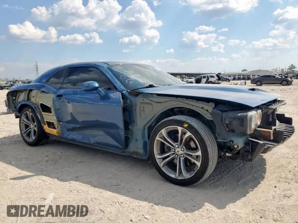 2020 Dodge Challenger R/T with VIN 2C3CDZBT9LH206810, listed as a Copart auction lot 81947315 with 103,097 mi miles and Salvage title. Bid and sale history available at DreamBid. Image 4.