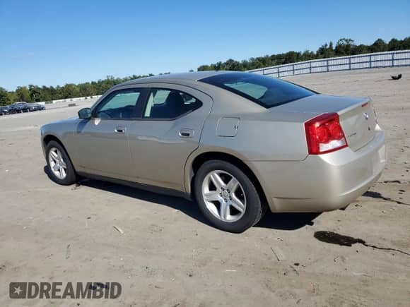 2009 Dodge Charger Police z VIN 2B3KA43T79H572065, wystawiony jako Copart lot #67554764 z przebiegiem 119 259 mil mil oraz Czysty tytuł • Clean title. Historia ofert i sprzedaży dostępna na DreamBid. Obrazek 2.