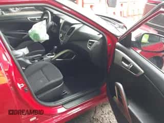 2016 Hyundai Veloster z VIN KMHTC6AD1GU272922, wystawiony jako IAAI lot #43115743 z przebiegiem 85 156 mil mil oraz . Historia ofert i sprzedaży dostępna na DreamBid. Obrazek 5.