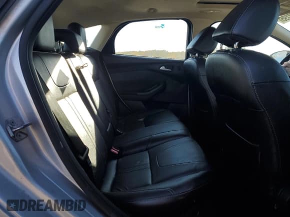 ✅ 2014 Ford Focus Titanium • VIN: 1FADP3N20EL383622 • Lot: 82553195. Listed on Copart with 91,901 mi. Free auction sales archive from the USA and detailed vehicle history report at DreamBid. Image 10.