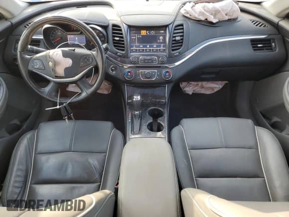 2014 Chevrolet Impala LTZ with VIN 1G1155S36EU145708, listed as a Copart auction lot 82423055 with 140,731 mi miles and Salvage title. Bid and sale history available at DreamBid. Image 8.