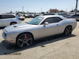 ✅ 2015 Dodge Challenger SXT Plus • VIN: 2C3CDZBG9FH912456 • Lot: 63134664. Wystawiony na Copart z przebiegiem 118 950 mil. Bezpłatny archiwum sprzedaży aukcyjnych z USA i szczegółowy raport historii pojazdu na DreamBid. Zdjęcie 1.