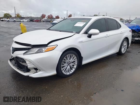 ✅ 2018 Toyota Camry Hybrid SE • VIN: 4T1B21HK0JU005414 • Lot: 43715775. Listed on IAAI with 176,737 mi. Free auction sales archive from the USA and detailed vehicle history report at DreamBid. Image 2.
