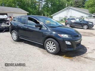 ✅ 2012 Mazda CX-7 i Touring • VIN: JM3ER2CM5C0415574 • Lot: 42263702. Wystawiony na IAAI z przebiegiem 293 566 mil. Bezpłatny archiwum sprzedaży aukcyjnych z USA i szczegółowy raport historii pojazdu na DreamBid. Zdjęcie 1.