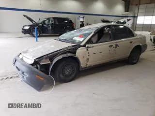 ✅ 1997 Saturn SL • VIN: 1G8ZH5288VZ126846 • Лот: 47024465. Опубликован ранее на Copart с пробегом 152 336 миль. Бесплатный доступ к архиву аукционных продаж из США и подробный отчёт об истории автомобиля на DreamBid. Изображение 1.