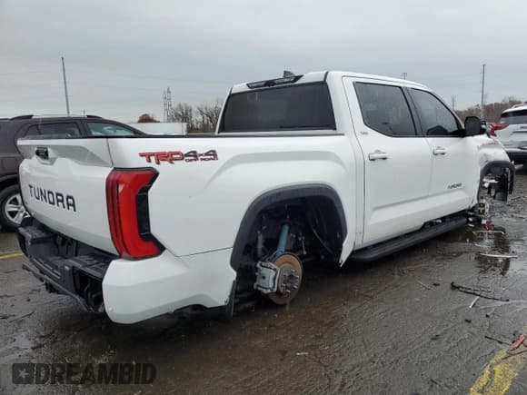 ✅ 2022 Toyota Tundra SR5 • VIN: 5TFLA5DB8NX048184 • Лот: 91788725. Опубликован ранее на Copart с пробегом Не указан. Бесплатный доступ к архиву аукционных продаж из США и подробный отчёт об истории автомобиля на DreamBid. Изображение 3.