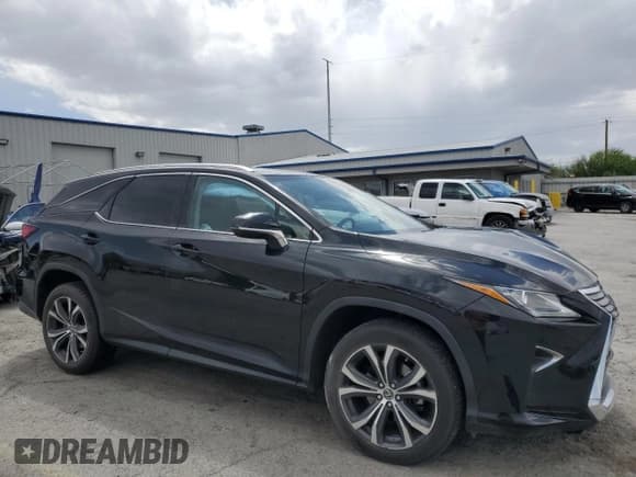 ✅ 2018 Lexus RX 350L Premium • VIN: JTJGZKCA9J2006290 • Lot: 56917285. Listed on Copart with 70,560 mi. Free auction sales archive from the USA and detailed vehicle history report at DreamBid. Image 4.