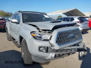 ✅ 2018 Toyota Tacoma SR5 • VIN: 3TMAZ5CN1JM067591 • Lot: 43516790. Listed on IAAI with 88,369 mi. Free auction sales archive from the USA and detailed vehicle history report at DreamBid. Image 1.