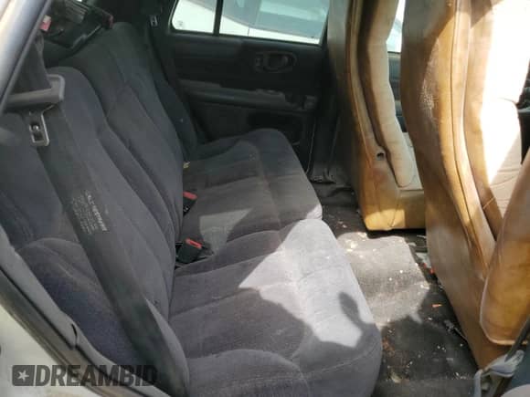 2001 Chevrolet Blazer LS z VIN 1GNCS13W91K247026, wystawiony jako Copart lot #64701453 z przebiegiem 250 681 mil mil oraz Czysty tytuł • Clean title. Historia ofert i sprzedaży dostępna na DreamBid. Obrazek 11.