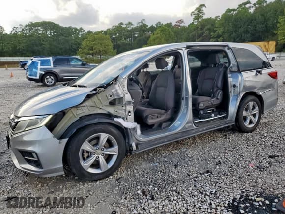 ✅ 2018 Honda Odyssey EX • VIN: 5FNRL6H52JB095665 • Lot: 89849205. Listed on Copart with 82,873 mi. Free auction sales archive from the USA and detailed vehicle history report at DreamBid. Image 1.