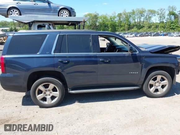 ✅ 2020 Chevrolet Tahoe LT • VIN: 1GNSKBKC6LR239081 • Lot: 42298842. Listed on IAAI with 125,328 mi. Free auction sales archive from the USA and detailed vehicle history report at DreamBid. Image 13.
