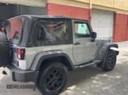 ✅ 2016 Jeep Wrangler Sport • VIN: 1C4AJWAGXGL117724 • Lot: 59418365. Listed on Copart with 122,337 mi. Free auction sales archive from the USA and detailed vehicle history report at DreamBid. Image 4.