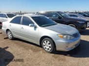 ✅ 2002 Toyota Camry LE • VIN: JTDBE32K520037087 • Lot: 43581793. Listed on IAAI with 216,243 mi. Free auction sales archive from the USA and detailed vehicle history report at DreamBid. Image 1.